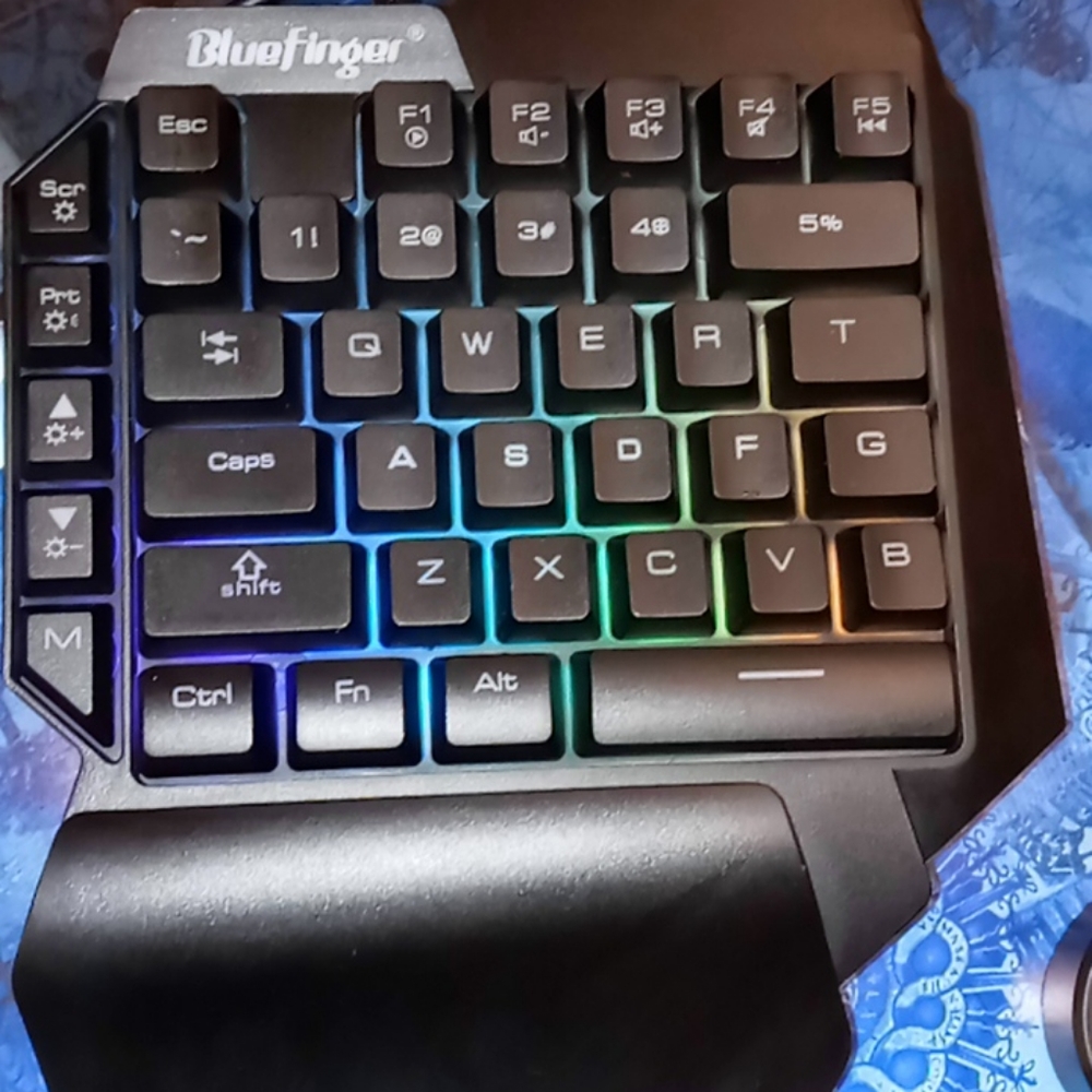 Blue finger gaming keyboard and mouse